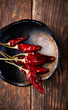 Dired chili peppers in a ceramic dish
