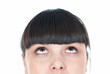 woman is looking up at something