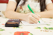Housewife making notes