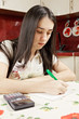 Woman making calculations