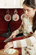 Photo: Serious woman cutting cabbage Serious woman cutting cabbage