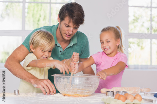 Photo: Children mixing the dough Children mixing the dough