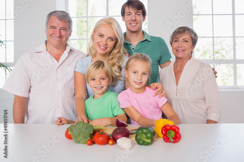 Photo: Family smiling with vegetables Family smiling with vegetables