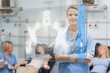Photo: Nurse standing with arms crossed next to patients Nurse standing with arms crossed next to patients