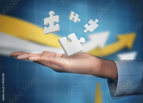 Photo: businessman showing a handshake to the camera businessman showing a handshake to the camera
