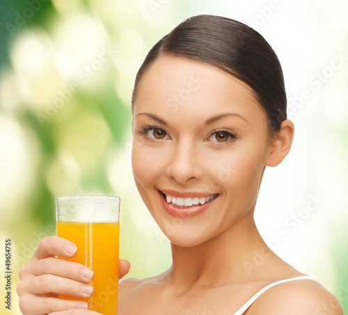 Photo: woman with glass of juice woman with glass of juice
