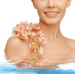 lovely woman with orchid flower
