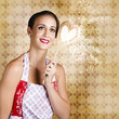 Smiling Female Cook Baking Cake With Sweet Love