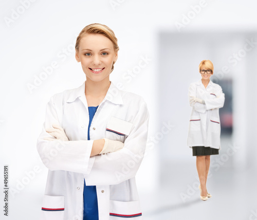 Photo: two attractive female doctors two attractive female doctors