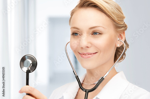 Photo: attractive female doctor with stethoscope attractive female doctor with stethoscope