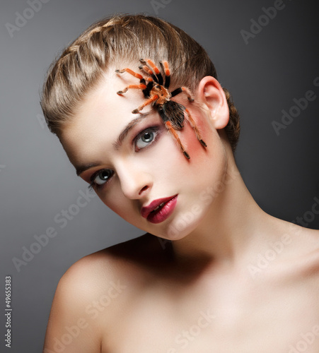 Photo: Fantasy. Portrait of beautiful Female Tamer with Spider Fantasy. Portrait of beautiful Female Tamer with Spider