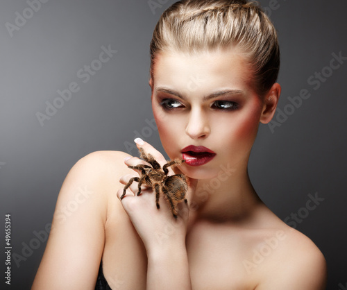 Photo: Beautiful Girl Holding Live Tamed Spider in her Hand Beautiful Girl Holding Live Tamed Spider in her Hand