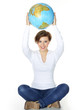 Woman holds the world globe over her head