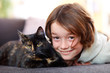 Photo: Young boy with cat Young boy with cat