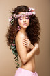 Sultry Beauty. Naked Woman - Long Curly Hair, Wreath of Flowers
