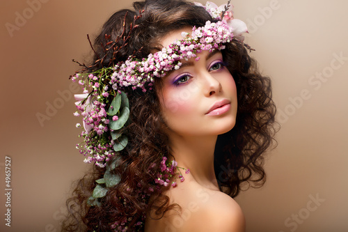 Photo: Nymph. Sensual Brunette with Garland of Flowers looks like Angel Nymph. Sensual Brunette with Garland of Flowers looks like Angel