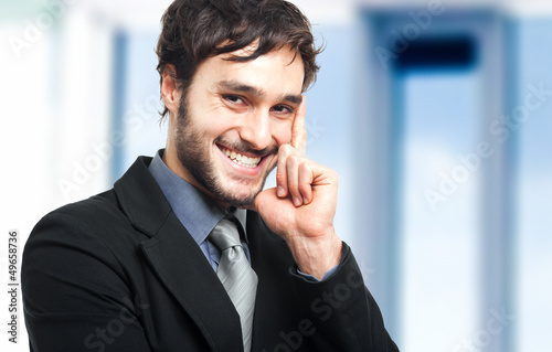 Photo: Handsome businessman in his office Handsome businessman in his office