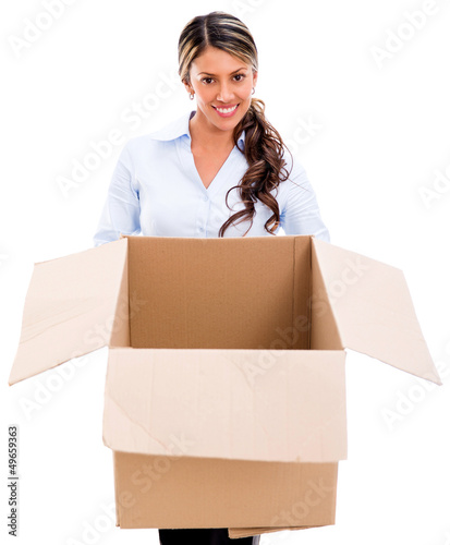 Photo: Thoughtful woman with an empty box Thoughtful woman with an empty box