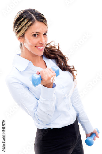 Photo: Business woman exercising Business woman exercising