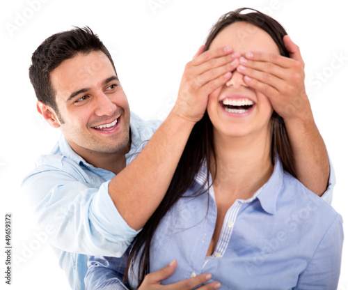 Photo: Boyfriend covering the eyes of his girlfriend Boyfriend covering the eyes of his girlfriend