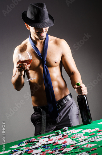 Photo: Naked broke businessman in casino Naked broke businessman in casino
