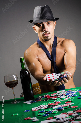 Photo: Naked broke businessman in casino Naked broke businessman in casino