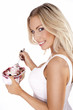 Beautiful blonde enjoying a delicious dessert