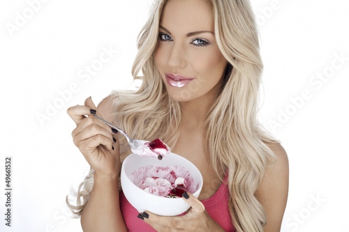 Photo: Beautiful woman enjoying dessert Beautiful woman enjoying dessert