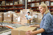 Photo: Workers In Distribution Warehouse Workers In Distribution Warehouse