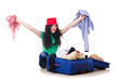 Young girl packing for vacation