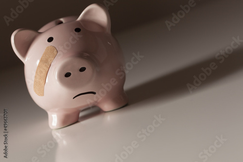 Photo: Piggy Bank with Bandage on Face Piggy Bank with Bandage on Face