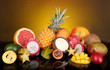 Composition of exotic fruits on colorful background