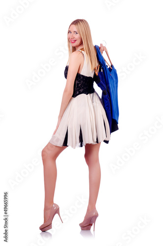 Photo: Woman trying new clothing on white Woman trying new clothing on white