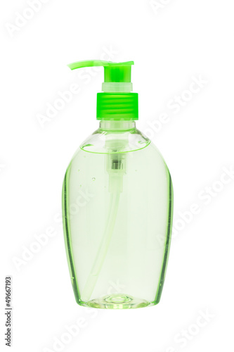 Photo: Hand sanitizer bottle with a pump dispenser isolated on white ba Hand sanitizer bottle with a pump dispenser isolated on white ba