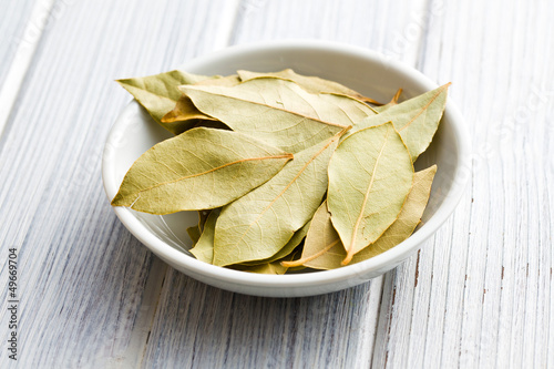 Photo: bay leaves in ceramic bowl bay leaves in ceramic bowl