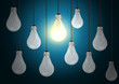 idea concept with light bulbs on a blue background