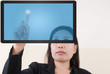 business lady pushing transparent keyboard on the whiteboard.