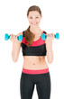 Beautiful young woman working out with dumbbells