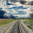 railroad to horizon and dramatic sky
