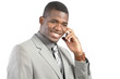 Smiling African American businessman on smartphone