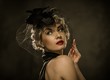 Elegant blond retro woman  with red lipstick