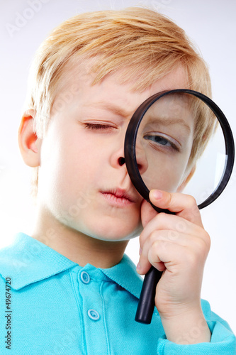Photo: Looking through magnifying glass Looking through magnifying glass