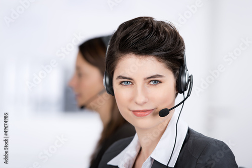 Photo: servicemitarbeiterin mit headset servicemitarbeiterin mit headset