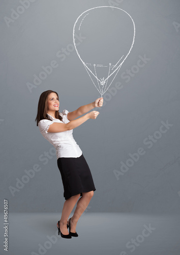 Photo: Beautiful woman holding balloon drawing Beautiful woman holding balloon drawing