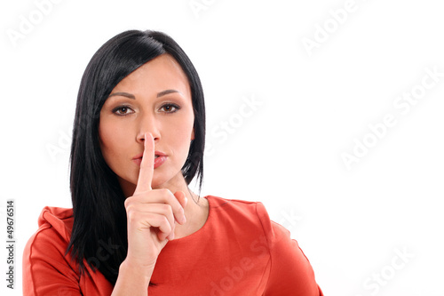 Photo: Beautiful woman asks be quiet Beautiful woman asks be quiet