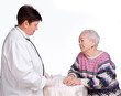 Doctor preparing injection for old woman