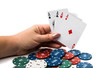 four aces with poker chips