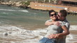 Couple in love on the beach, super slow motion