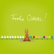Vektor: Osterhase malt Eier am Fliessband an Osterhase malt Eier am Fliessband an