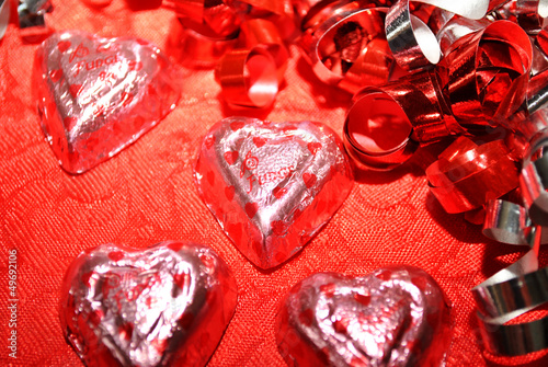 Photo: Wrapped Chocolate Heart Candies with Ribbons Wrapped Chocolate Heart Candies with Ribbons